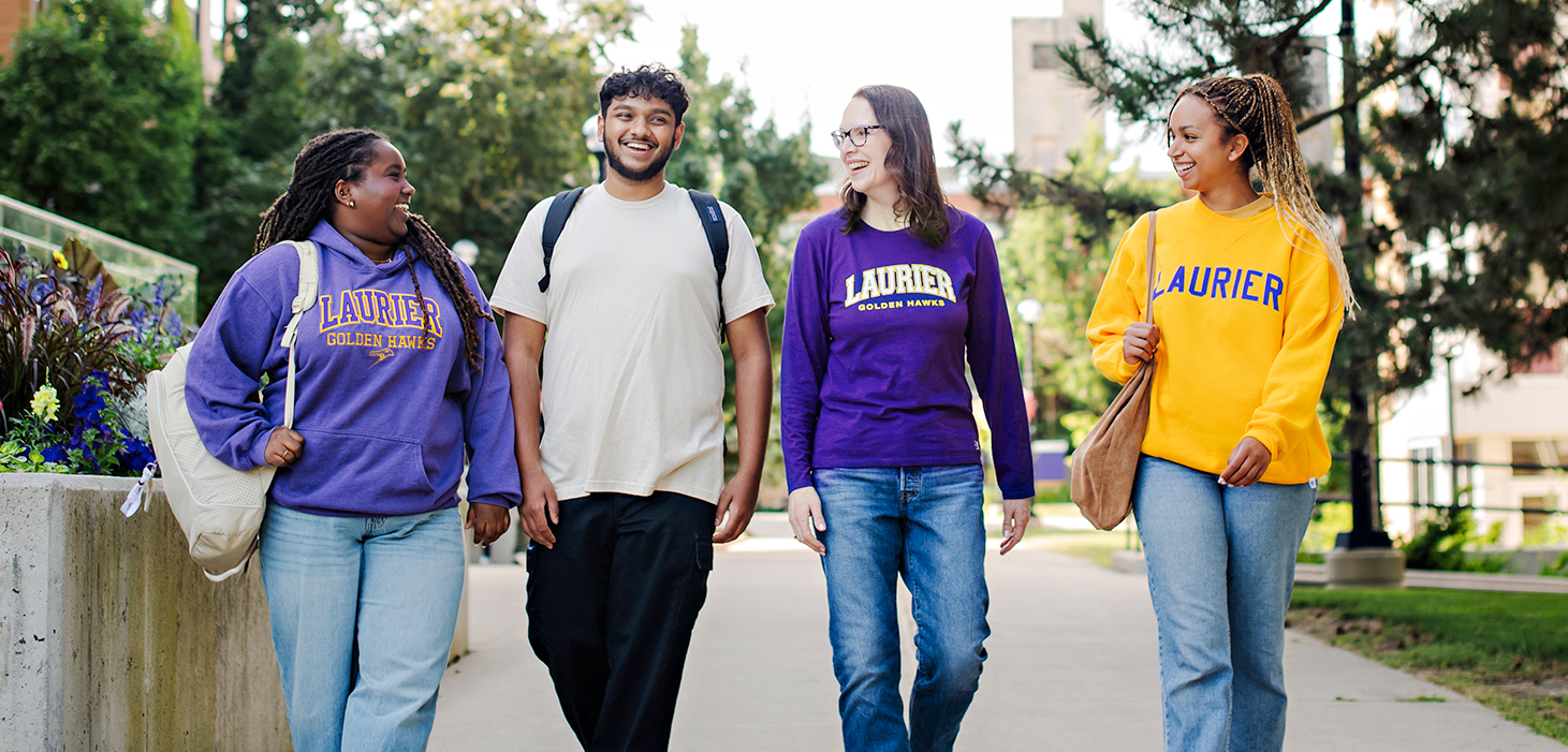 Deb walking with Students