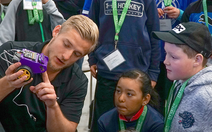 Showing robot to students