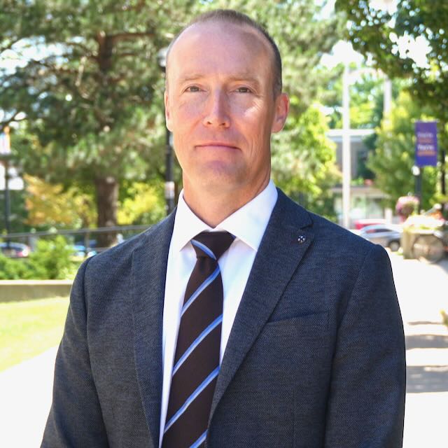 Jonathan Finn in a suit