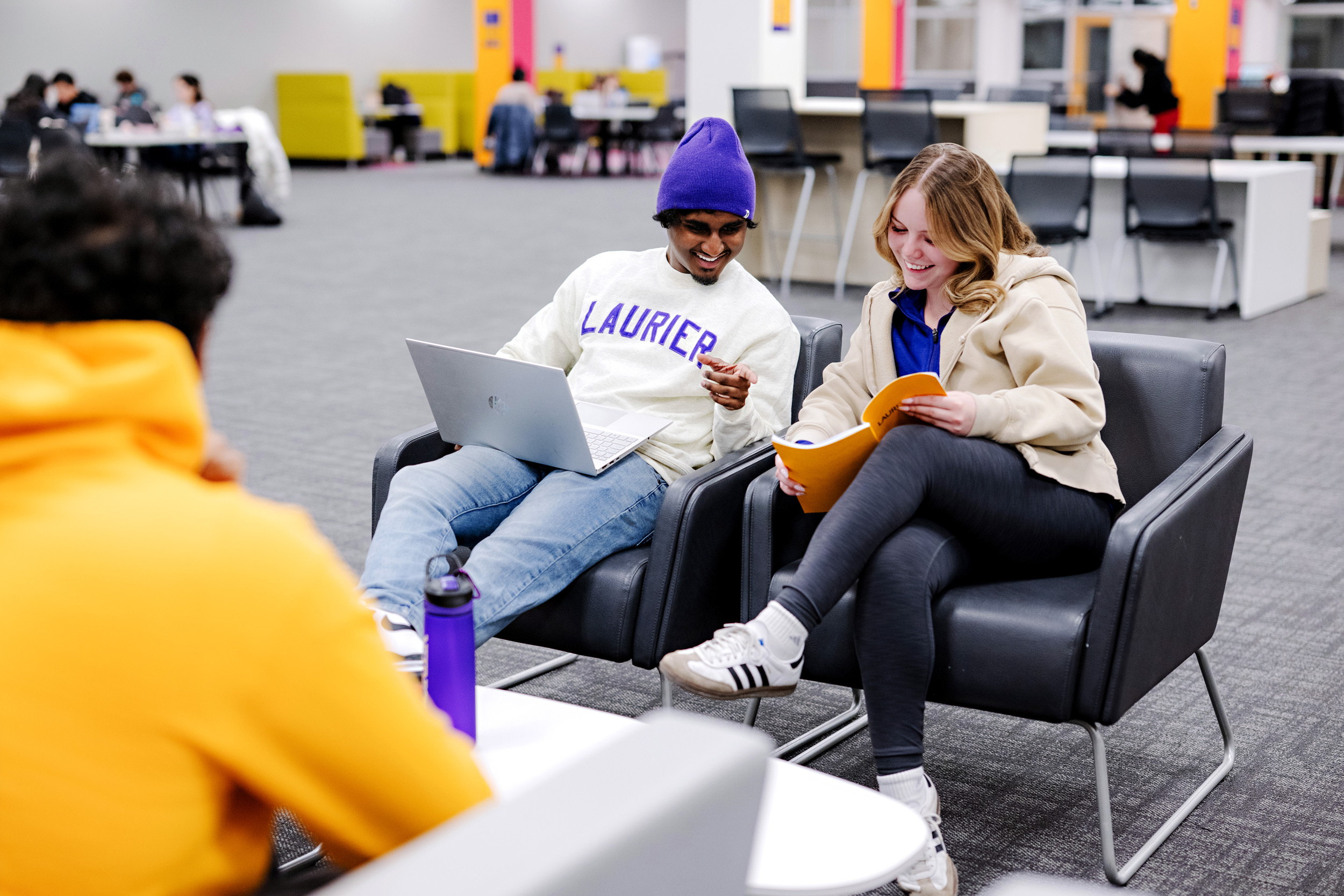 Small group of students studying together inside One Market building