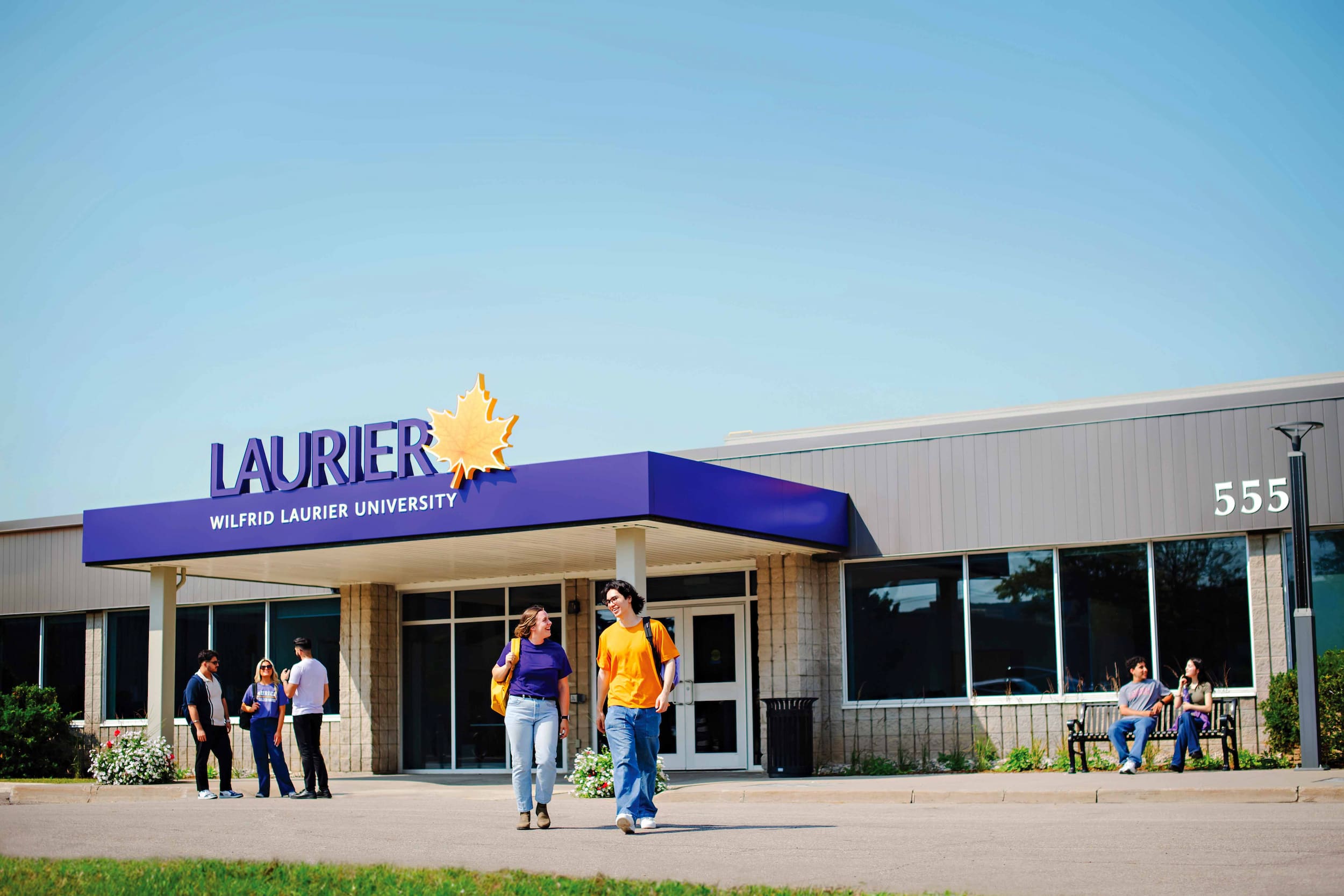 Students outside of Laurier Milton Academic Centre front entrance