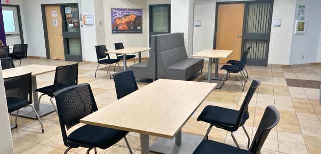 Rows of tables with chairs and booth seating