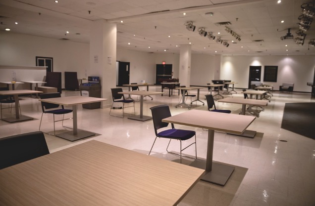 Rows of tables in an open floor space