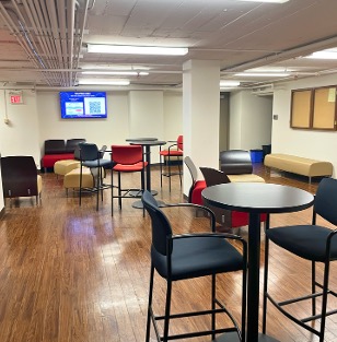 Lounge area with various benches, chairs and tables