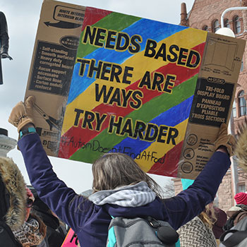 protestor holding sign