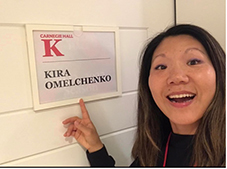 Kira Omelchenko pointing to her dressing room label