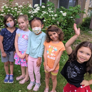 Students playing outside at the Beckett School at Laurier