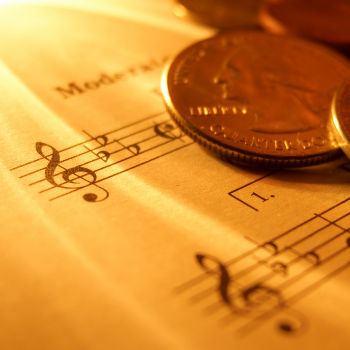 sheet music and coins