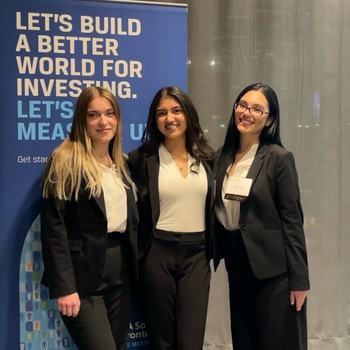 Three women standing together.