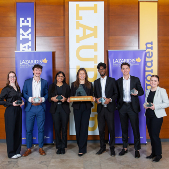 Winning team members with ICE trophy