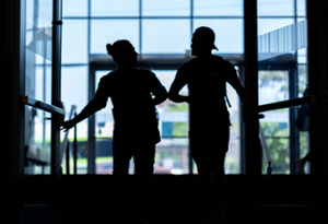 students silhouetted in lazaridis hall
