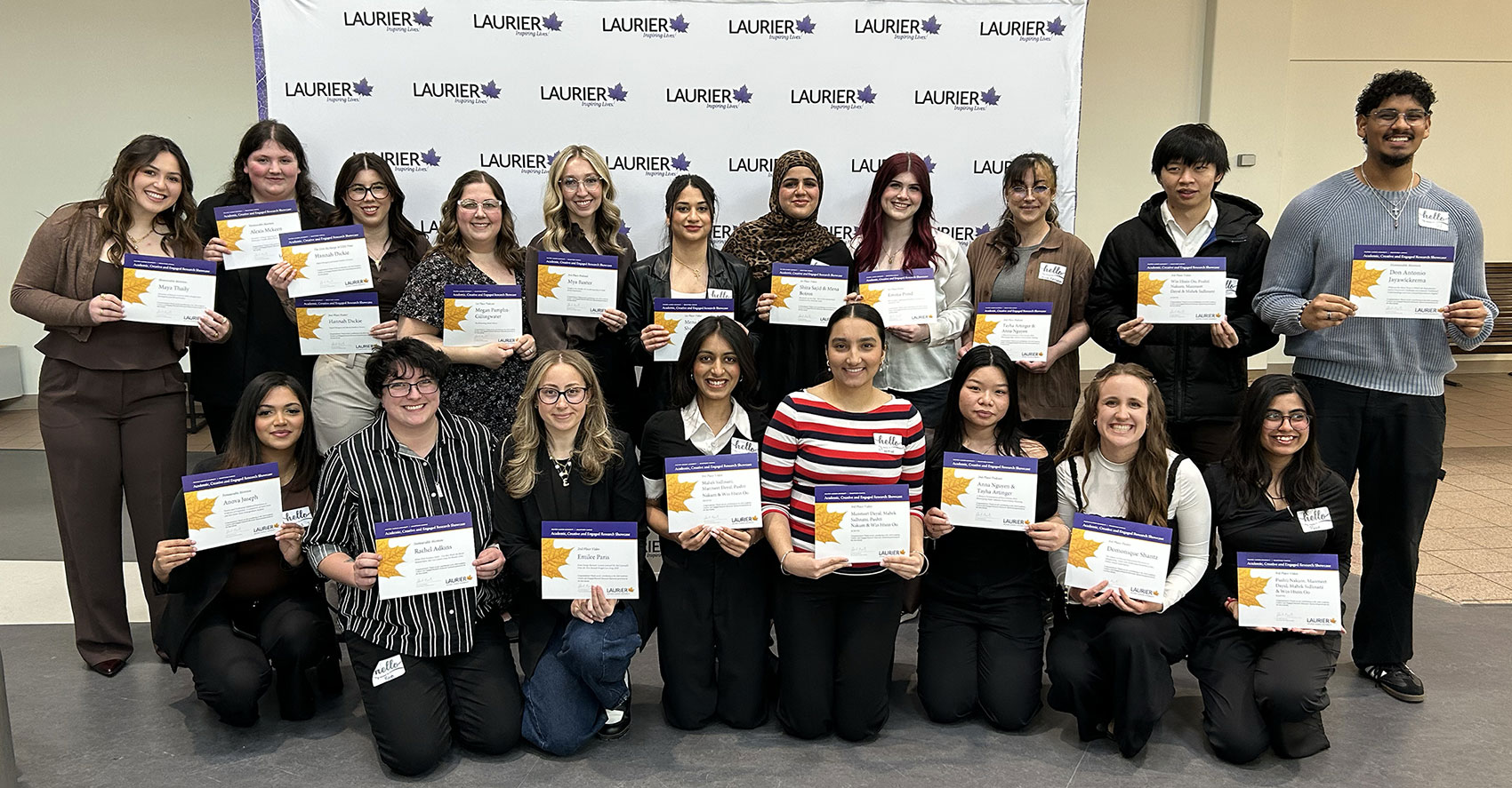 A group of undergraduate researchers proudly hold their ACERS certificates