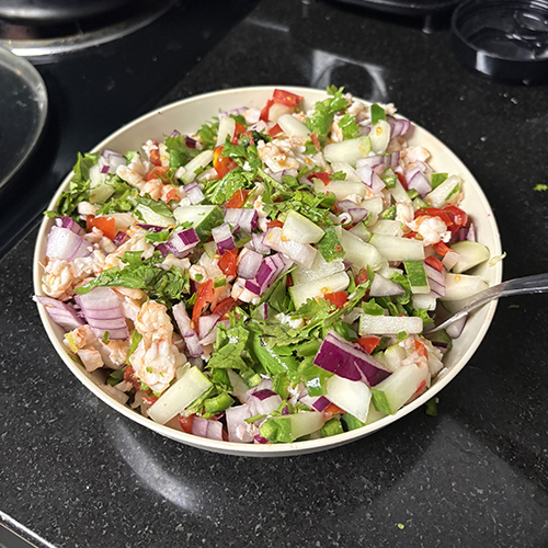 Shrimp salad with a variety of veggies