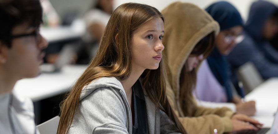 maya sitting in lecture