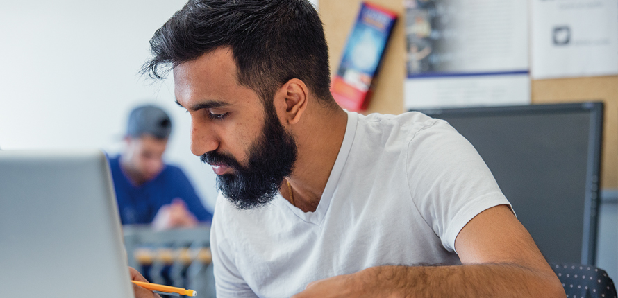 student working at computer