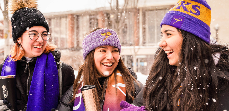 Four Laurier students walking on campus