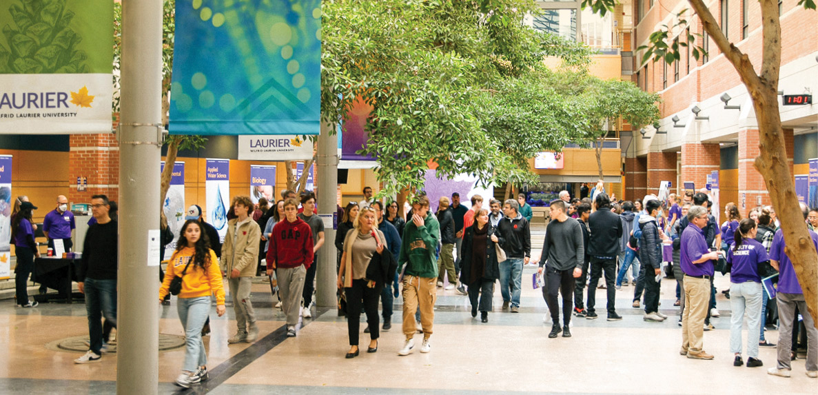 Open house guests in the Science Building's atrium.