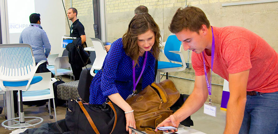 Two students discussing project.