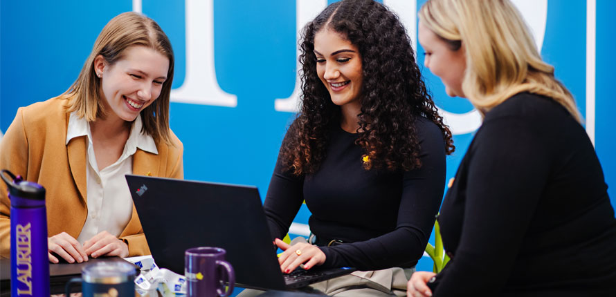 Student chats with work colleagues