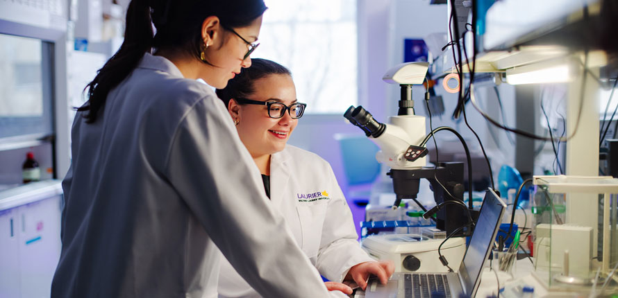 two students in the lab