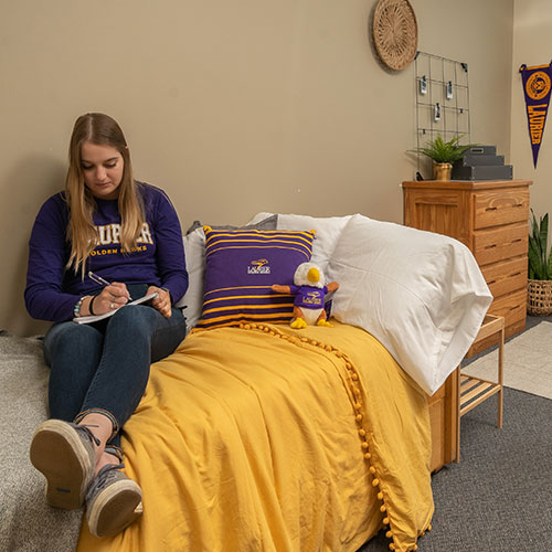 Student on bed