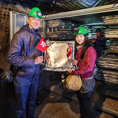 Christina Han standing in front of an underground vault