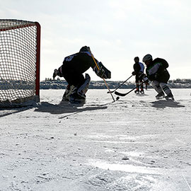 Spotlight story image pertaining to playing hockey on outdoor rink