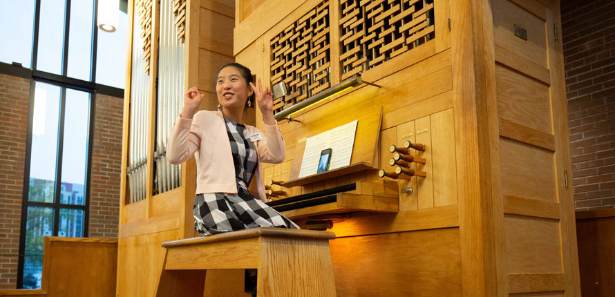 Charlotte plays the organ