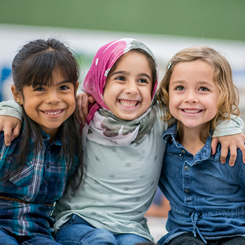 Three girls sitting together