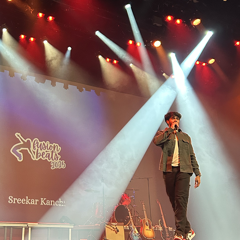 Rapper Sreekar Kanchi performs on stage at the Sanderson Centre for Fusion Beats 2025