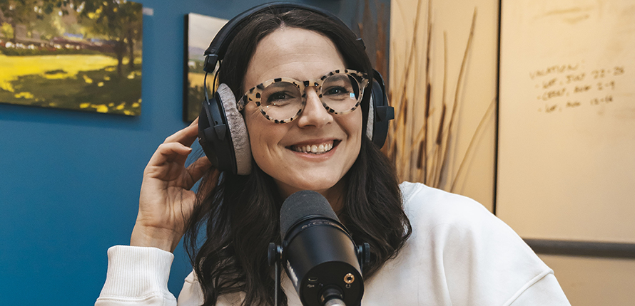 Avery Moore Kloss in a podcasting studio