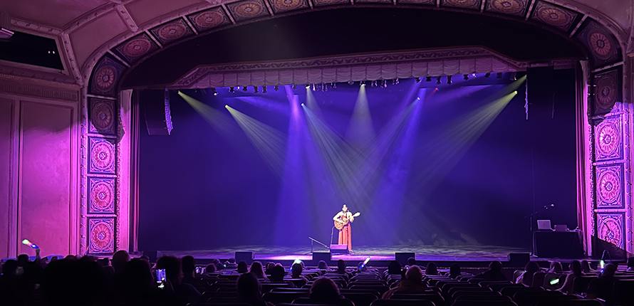Performer on stage at Sanderson Centre