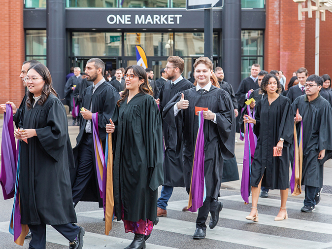 Laurier graduates cross Dalhousie Street at convocation