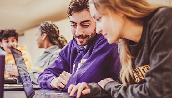 students talking in class