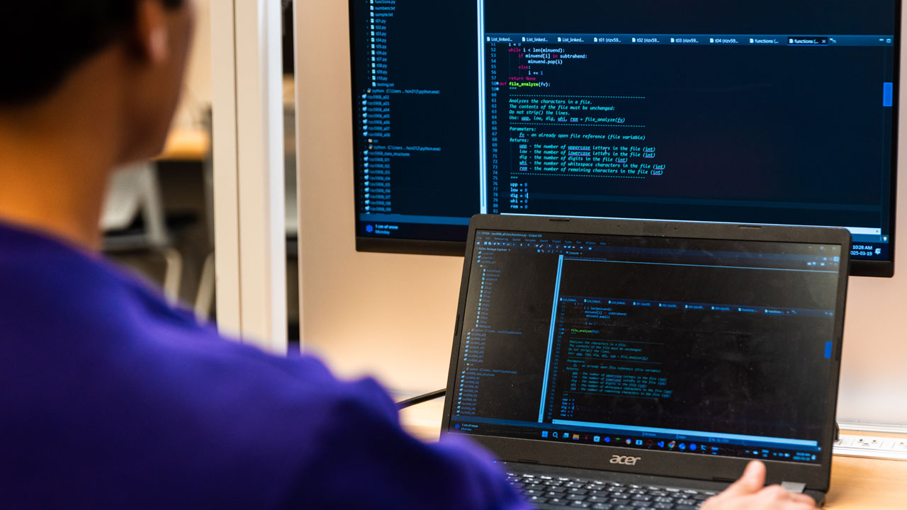 student works at computer