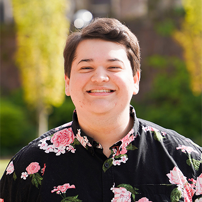 headshot of social work student Sayak Sneddon-Ghosal